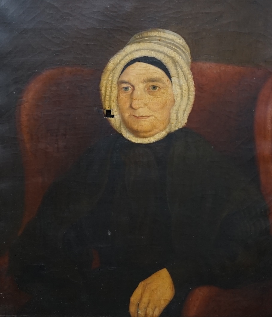 Early 19th century, English School, oil on canvas, Portrait of an elderly woman wearing a bonnet, 75 x 62cm. Condition - poor, hole in canvas